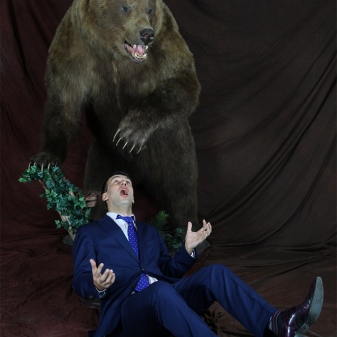 Aris Dreimanis and Bear having a friendly tumble or mauling in slow motion?