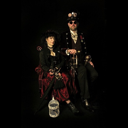 Mr Richard and Mrs Sara Ede, looking stupendously Steampunked , Richard is wearing the extremely rare Rochester Reynard Chain Chelsea.