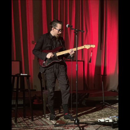 Mr DeLucco playing the Blues in His Jeffery-West Shoes....